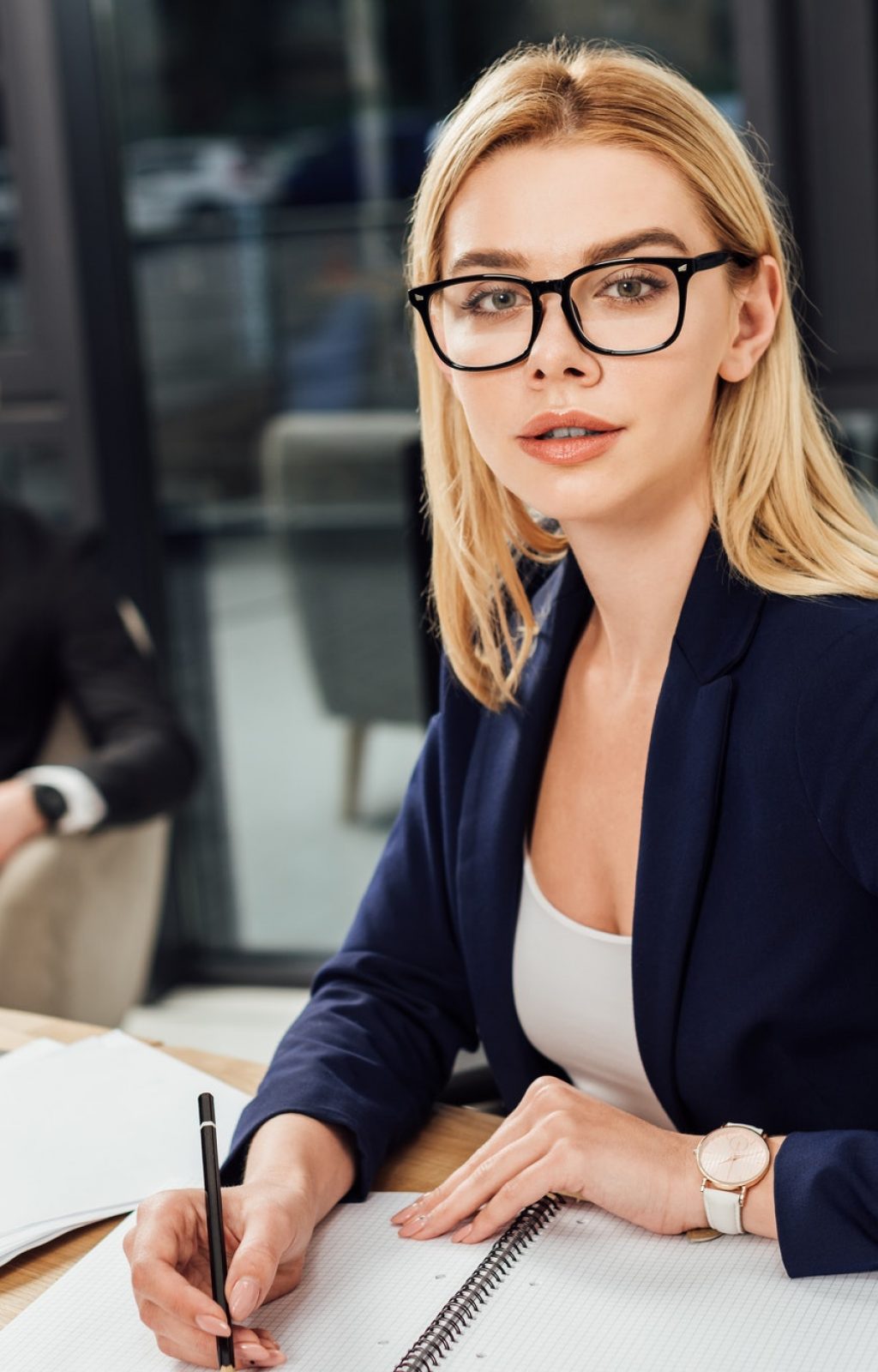 selective-focus-of-businessman-looking-at-businesswoman-in-eyeglasses-that-looking-at-camera-at.jpg